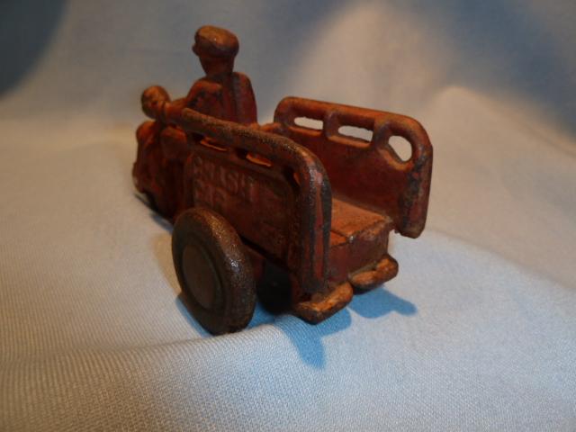 ANTIQUE CAST IRON RED CRASH CAR HARLEY WITH DRIVER AND CRASH CART