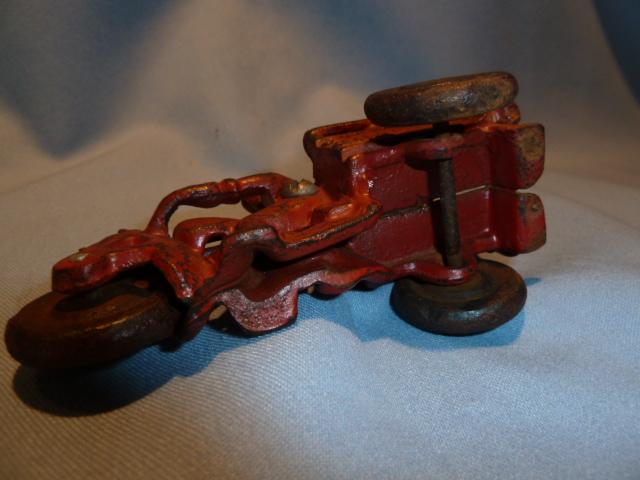 ANTIQUE CAST IRON RED CRASH CAR HARLEY WITH DRIVER AND CRASH CART