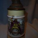 ANTIQUE GERMAN LIDDED BEER STEIN KING ON BARREL WITH LITHO BOTTOM C. 1890