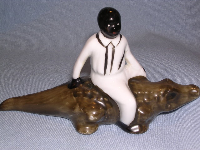 BLACK MEMORABILIA MAN ON GATER FIGURINE