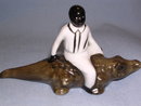 BLACK MEMORABILIA MAN ON GATER FIGURINE