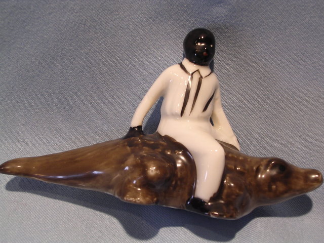 BLACK MEMORABILIA MAN ON GATER FIGURINE