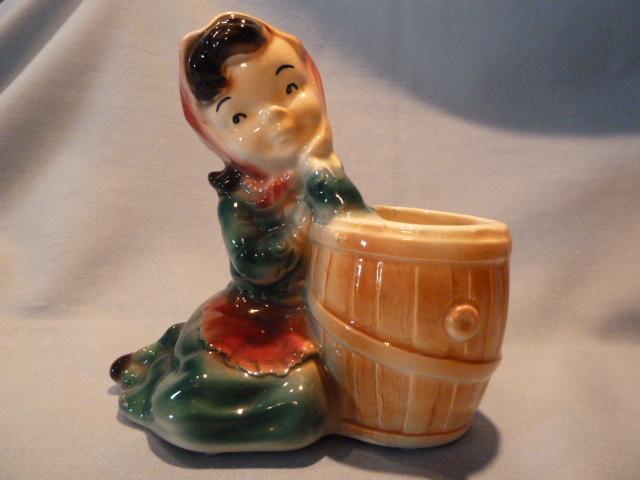VINTAGE ROYAL COPLEY GIRL LEANING ON A BARREL PLANTER