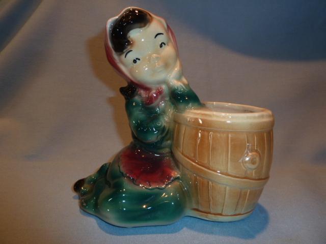 VINTAGE ROYAL COPLEY GIRL LEANING ON A BARREL PLANTER