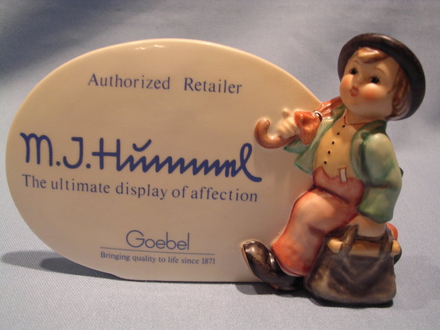 GOEBEL HUMMEL AUTHORIZED DEALER SIGN #187A WITH THE WANDERER FIGURINE, SIGNED