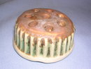 ROSEVILLE POTTERY DONATELLO FLOWER FROG GREEN & BROWN