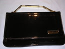 VINTAGE BLACK PATENT LEATHER CLUTCH PURSE WITH GOLD LINK HANDLE AND DECORATTION