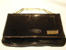 VINTAGE BLACK PATENT LEATHER CLUTCH PURSE WITH GOLD LINK HANDLE AND DECORATTION