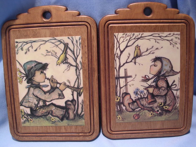 PAIR B. HUMMEL BOY AND GIRL PRINTS ON WOOD PLAQUES WALL HANGING