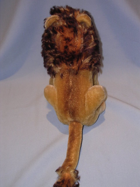 STEIFF LEO LION SITTING TOY ANIMAL WITH BUTTON