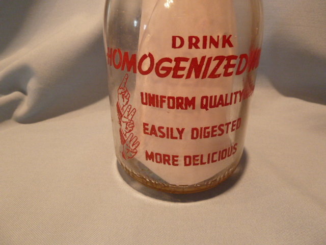 VINTAGE QUALITY AND SERVICE DAIRY RED LION, PA RED PYRO ROUND QUART BOTTLE