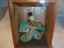 ANTIQUE JAPANESE DOLL WITH SWORD IN WOOD AND GLASS SHADOW BOX