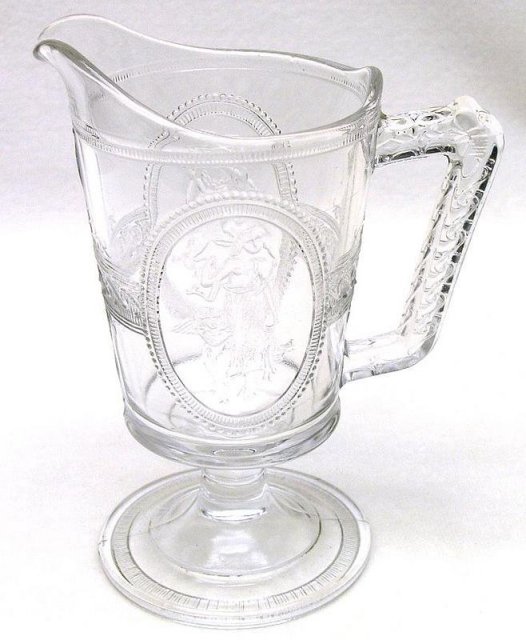 EAPG Cupid and Venus Footed Milk Pitcher