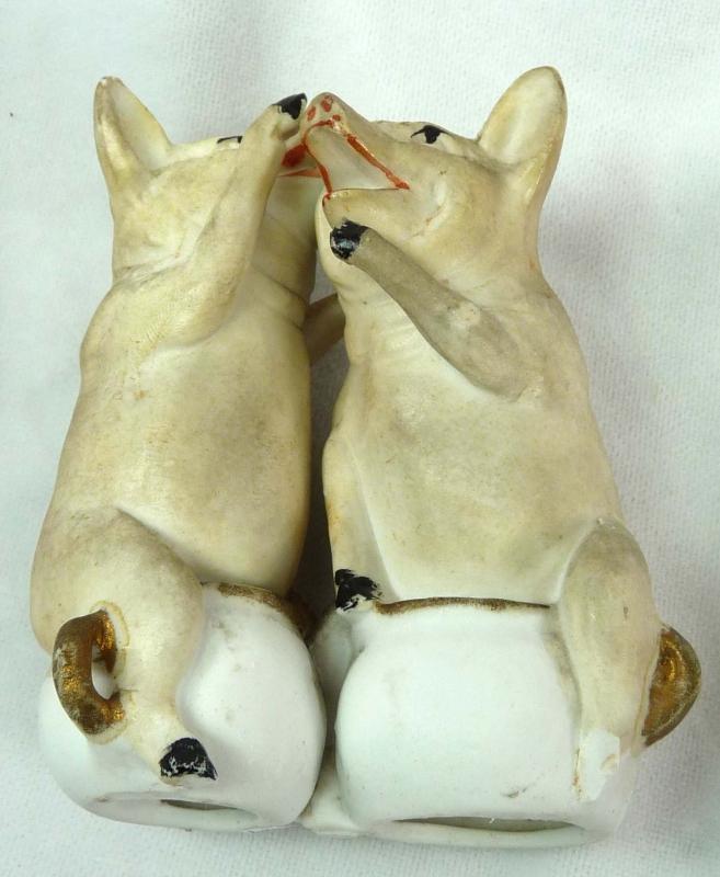 Old German Bisque 2 pink PIGS Sitting on Cup Whispering