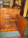 SMALL MAHOGANY CUPBOARD WITH FAUX BOOK FRONT DOORS
