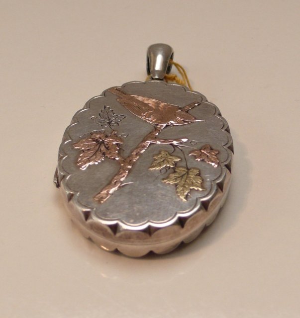 Victorian Sterling Silver Locket with gold overlay