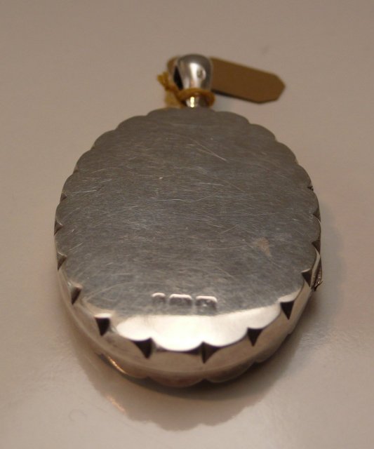 Victorian Sterling Silver Locket with gold overlay