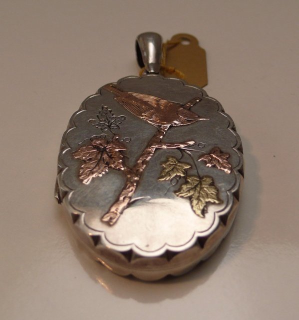 Victorian Sterling Silver Locket with gold overlay