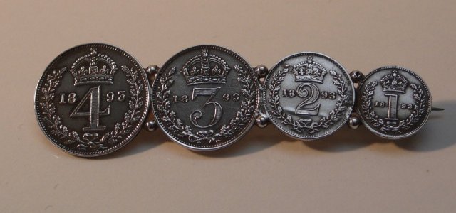 Victorian silver money brooch