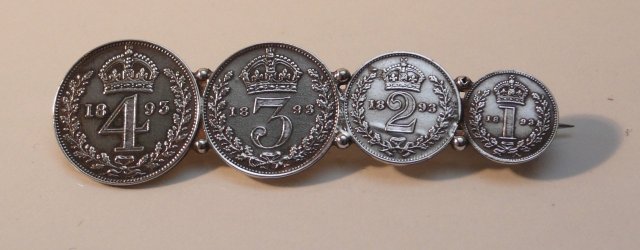 Victorian silver money brooch
