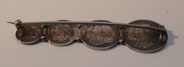 Victorian silver money brooch