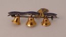 18 Kt. Gold & enamel Ringing Bells Brooch