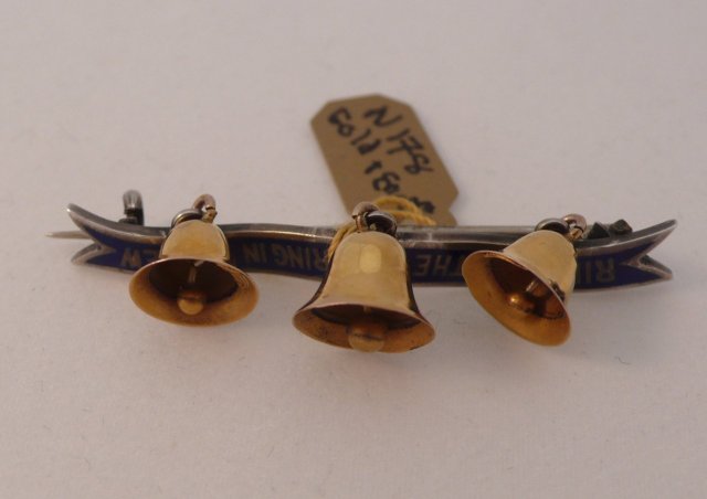 18 Kt. Gold & enamel Ringing Bells Brooch
