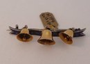 18 Kt. Gold & enamel Ringing Bells Brooch