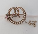 Victorian 18 Kt. Gold and Pearls and ruby Serpent Brooch