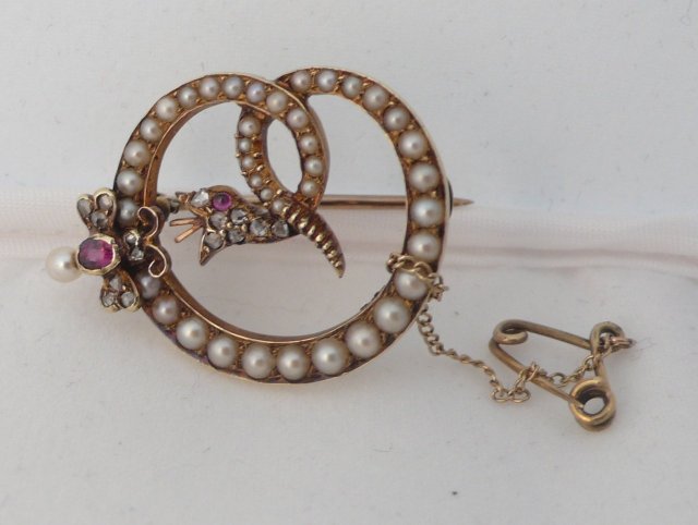 Victorian 18 Kt. Gold and Pearls and ruby Serpent Brooch