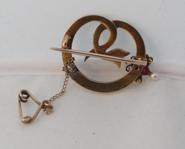 Victorian 18 Kt. Gold and Pearls and ruby Serpent Brooch