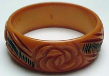 Bakelite Butterscotch and Black Carved Flower Bangle