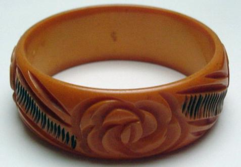 Bakelite Butterscotch and Black Carved Flower Bangle