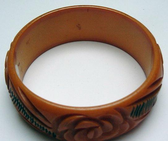 Bakelite Butterscotch and Black Carved Flower Bangle