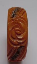 Bakelite Butterscotch and Black Carved Flower Bangle