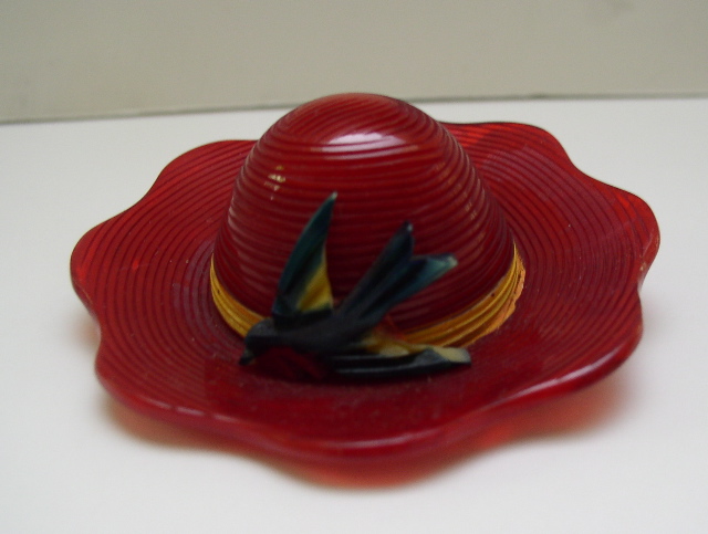 Bakelite vintage Bright Red Hat with a Green Bird Pin