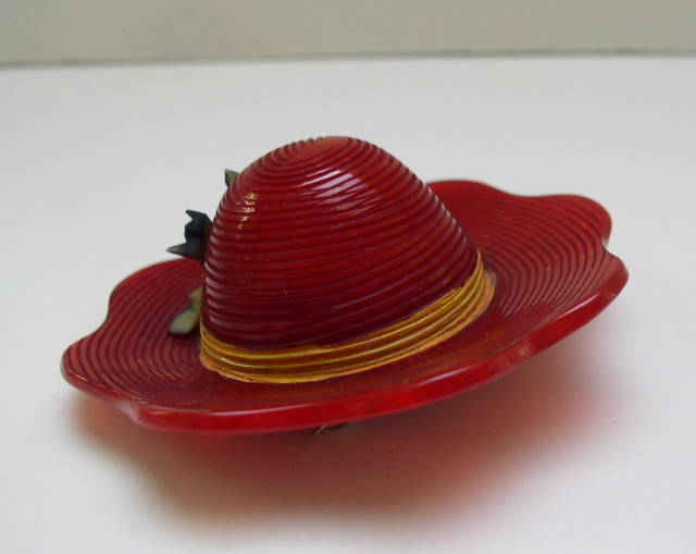 Bakelite vintage Bright Red Hat with a Green Bird Pin