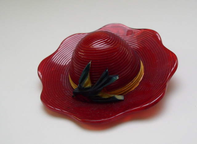 Bakelite vintage Bright Red Hat with a Green Bird Pin