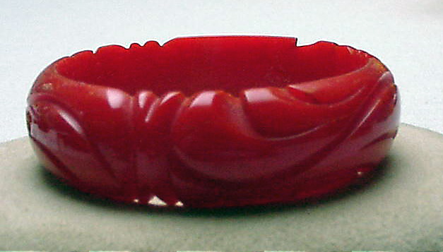 Bakelite Coral Red Carved Bangle