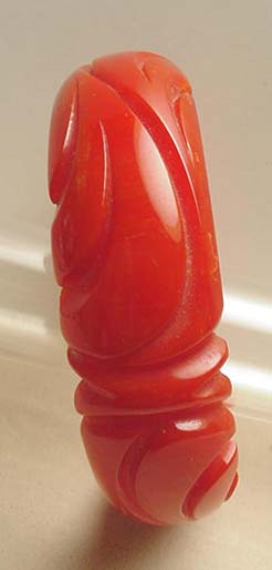 Bakelite Coral Red Carved Bangle