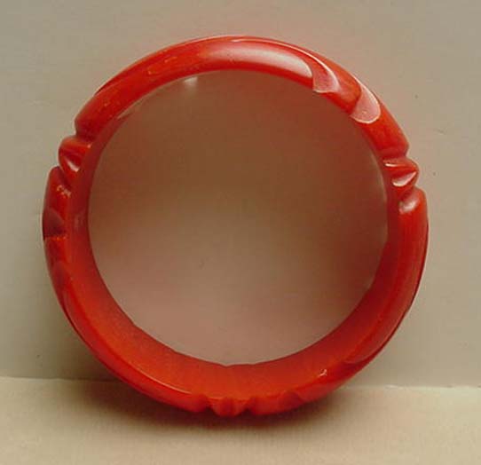 Bakelite Coral Red Carved Bangle
