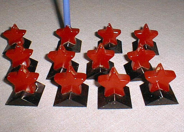 Bakelite set of 12 star candlestick holders
