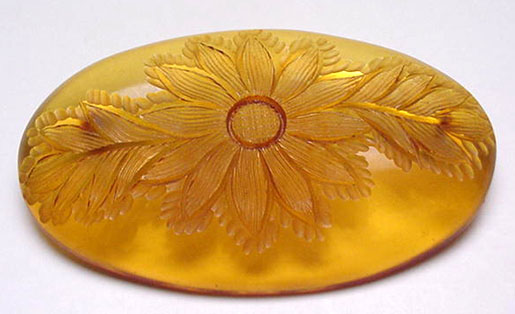 Bakelite vintage applejuice carved brooch