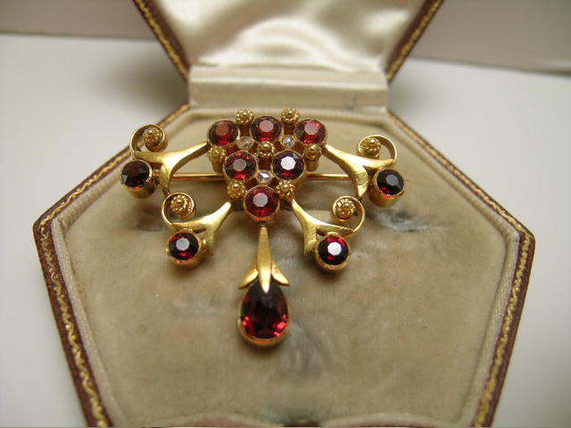 Edwardian 15 Ct. Gold and Garnet Brooch