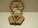 Edwardian 15 Ct. Gold and Garnet Brooch