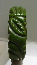 Bakelite green carved bangle