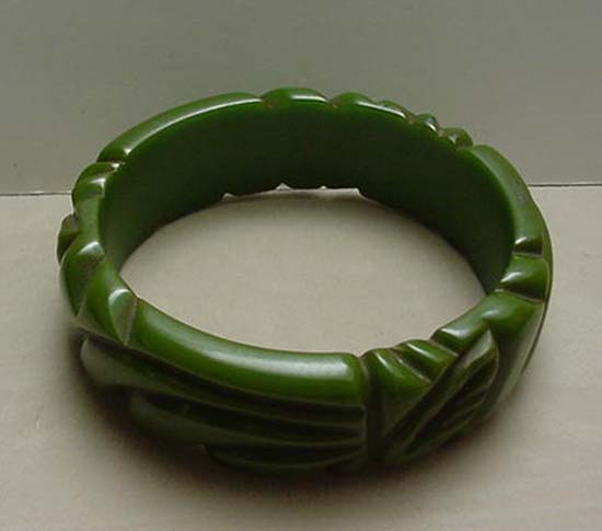 Bakelite green carved bangle