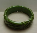 Bakelite green carved bangle