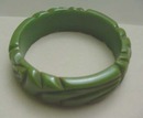Bakelite green carved bangle