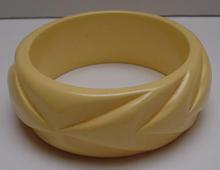 Bakelite Wide Taffy Colored Carved Bangle